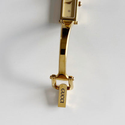 Gucci 1990s Gold Rectangular Dial Gold Plated Bangle Watch