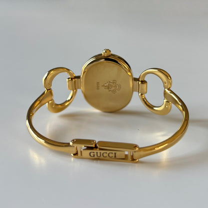 Gucci 1990s Oval Gold Dial Gold Plated Bangle Watch (Small)