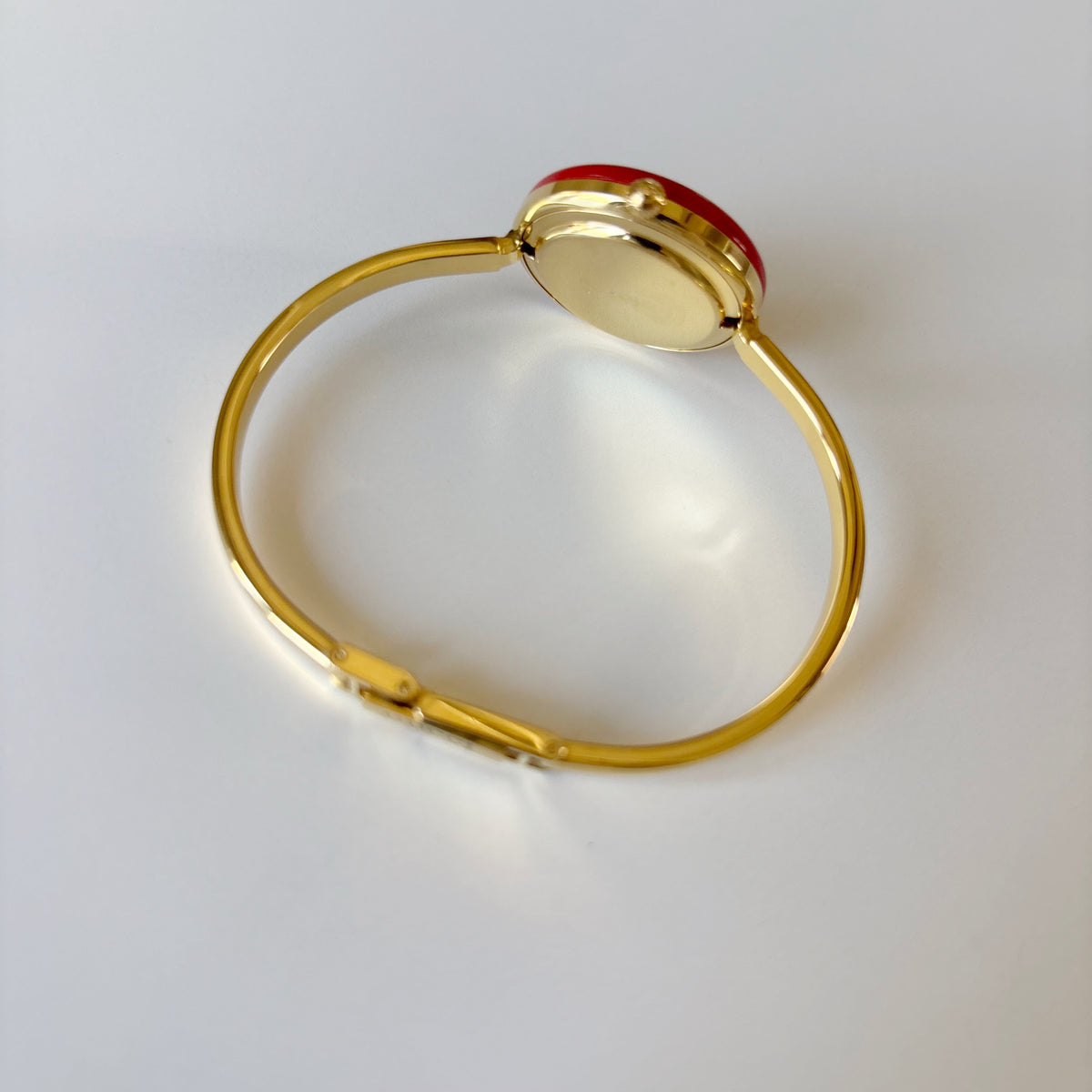 Gucci 1990s Interchangeable Bezel Gold Plated Bangle Watch with 12 bezels, case