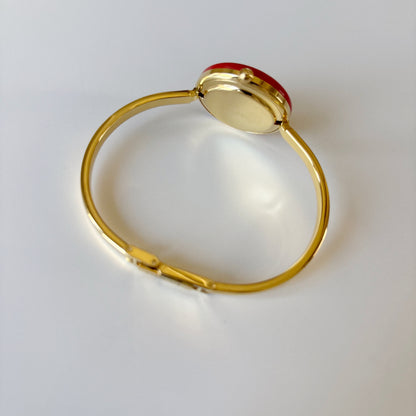 Gucci 1990s Interchangeable Bezel Gold Plated Bangle Watch with 12 bezels, case