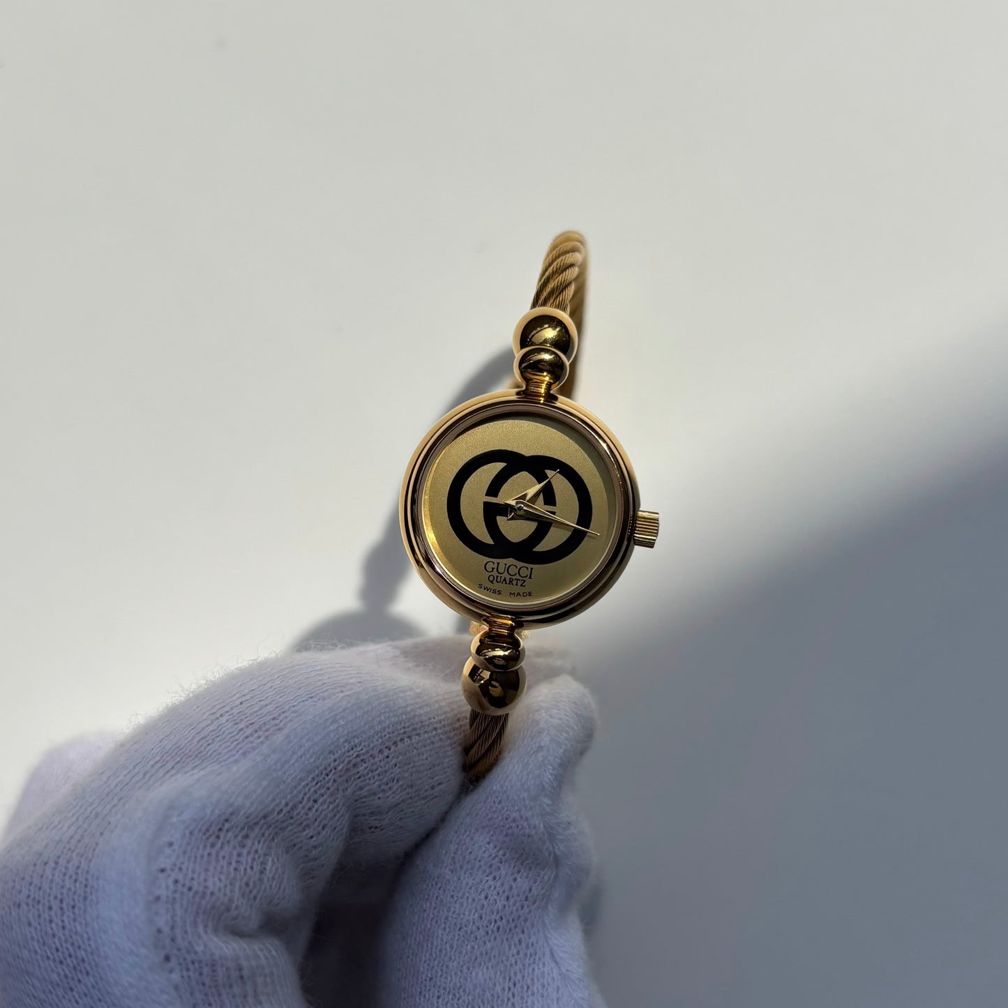 Gucci 1980s Round Dial Cable Band Bangle Watch