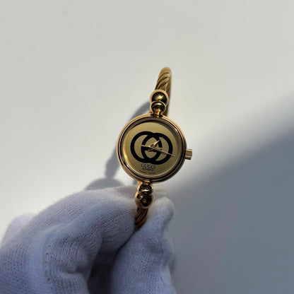 Gucci 1980s Round Dial Cable Band Bangle Watch