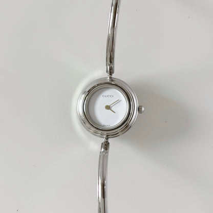 Gucci 1990s Interchangeable Bezel Stainless steel Bangle Watch with 12 bezels, case