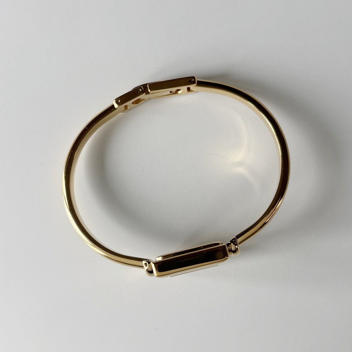 Gucci 1990s Square Dial Gold Plated Bangle Watch