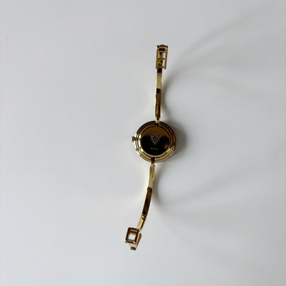 Gucci 1990s Interchangeable Bezel Gold Plated Bangle Watch with 12 bezels, case