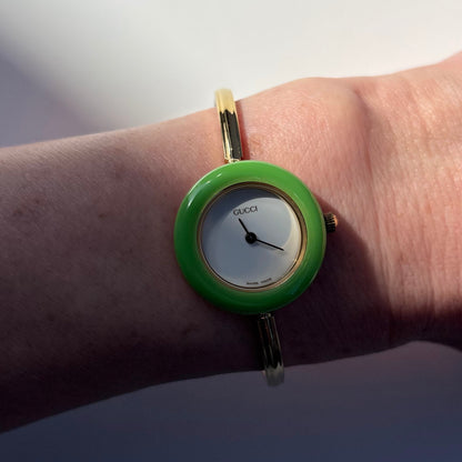 Gucci 1990s Interchangeable Bezel Gold Plated Bangle Watch with 12 bezels, case