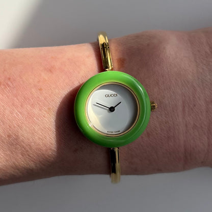 Gucci 1990sInterchangeable Bezel Gold Plated Bangle Watch with 12 bezels, case