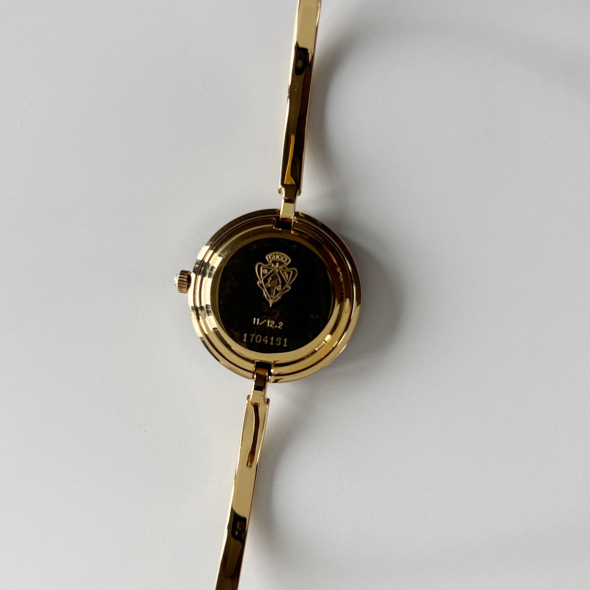 Gucci 1990s Interchangeable Bezel Gold Plated Bangle Watch with 12 bezels, case