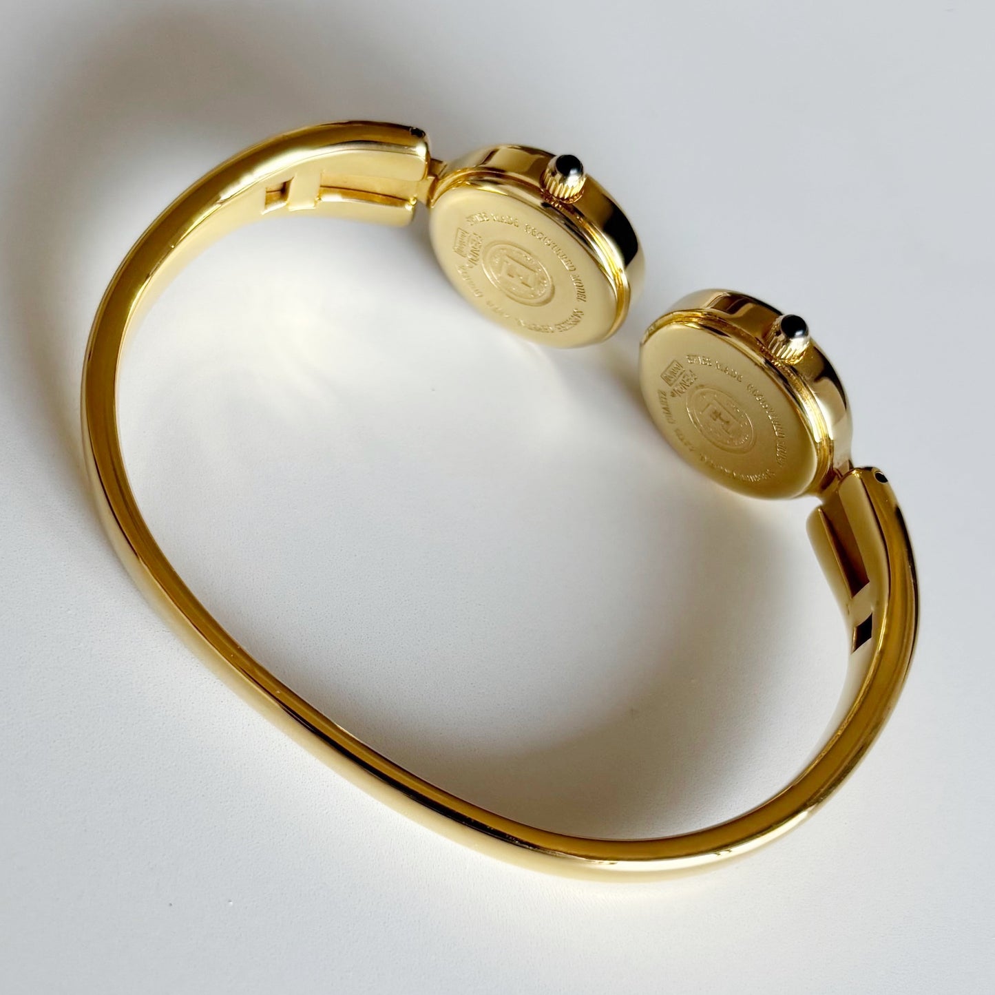 Fendi 1990s Seashell Dial Two Time Zone Gold Plated Bangle Watch