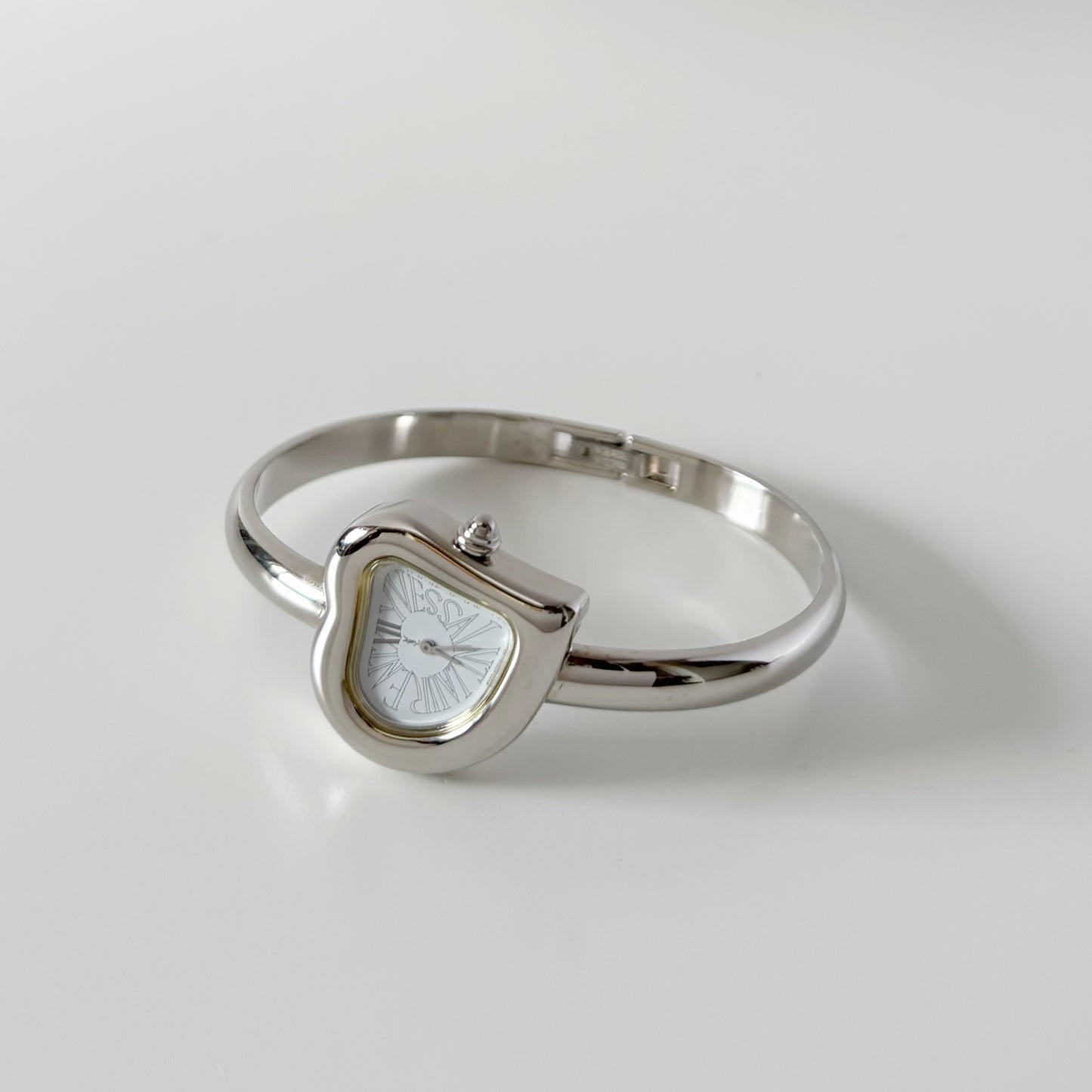 Yves Saint Laurent 1990s Heart Shaped Dial Silver Bangle Watch