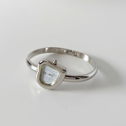 Yves Saint Laurent 1990s Heart Shaped Dial Silver Bangle Watch