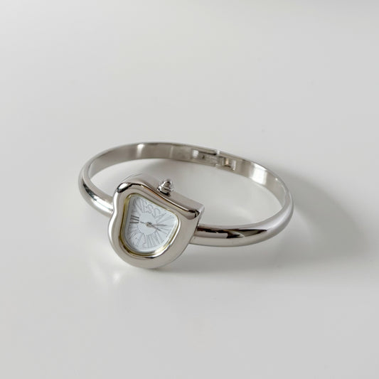 Yves Saint Laurent 1990s Heart Shaped Dial Silver Bangle Watch