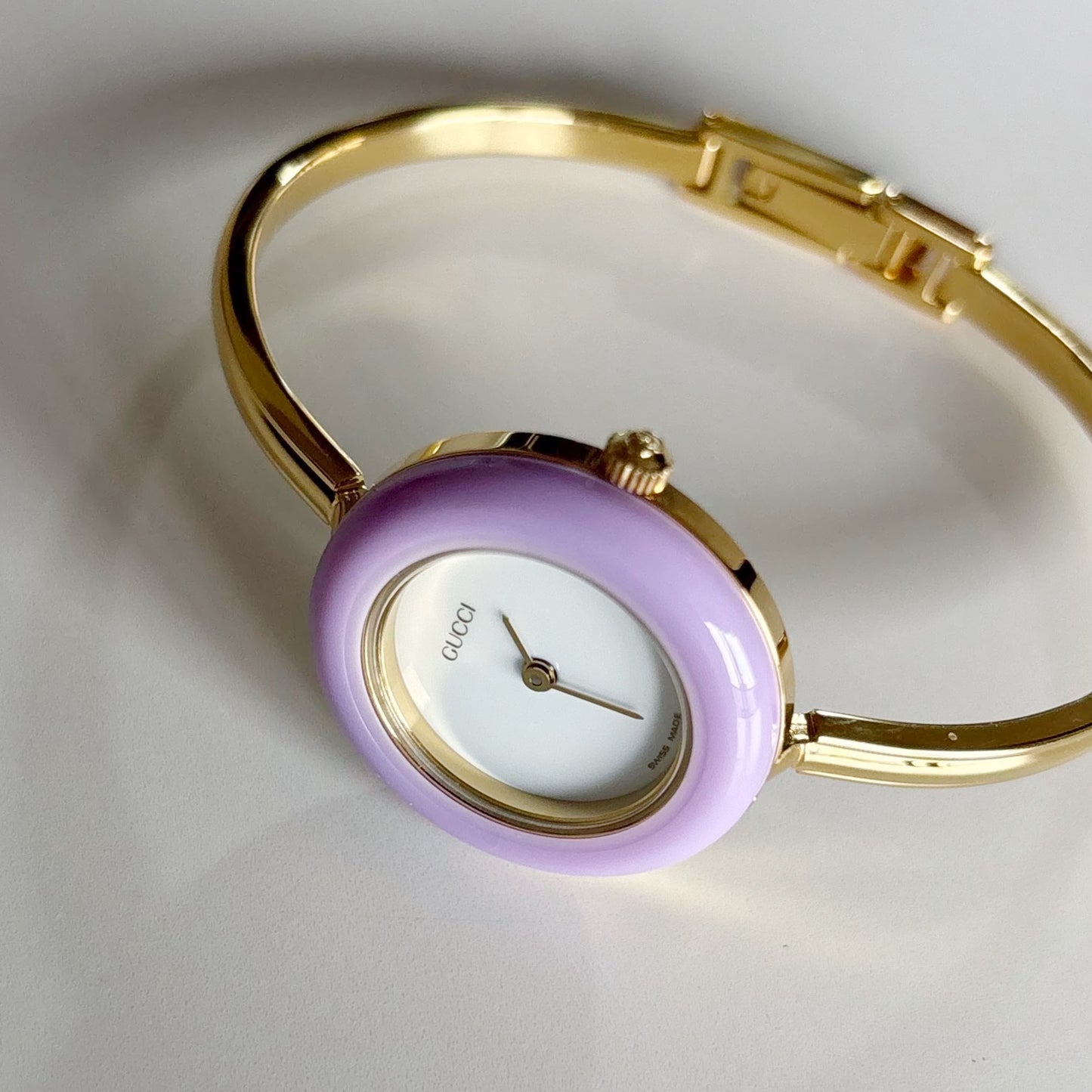 Gucci 1990s Interchangeable Bezel Gold Plated Bangle Watch with 12 bezels, case