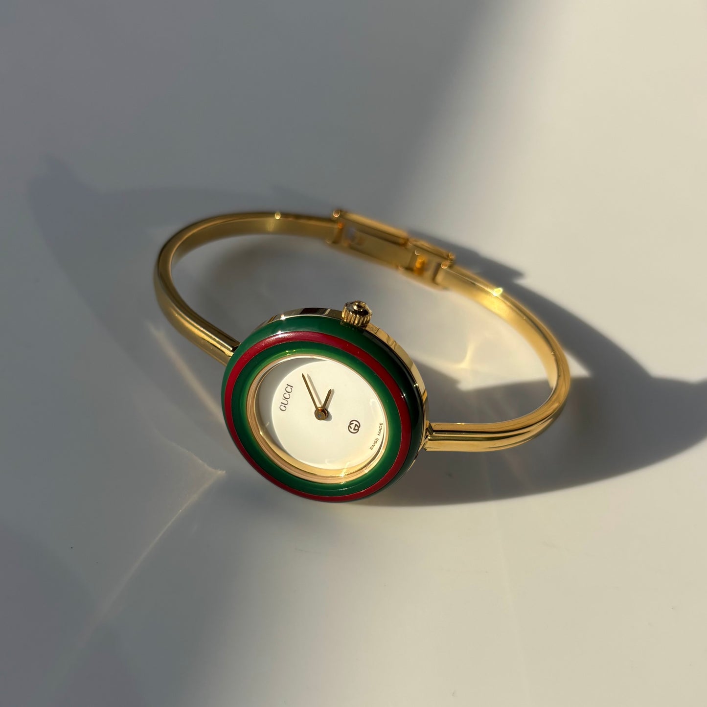 Gucci 1990s Interchangeable Bezel Gold Plated Bangle Watch with 12 bezels, case