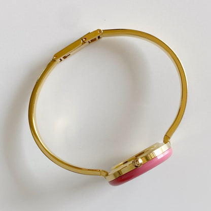 Gucci 1990s Interchangeable Bezel Gold Plated Bangle Watch with 12 bezels, case