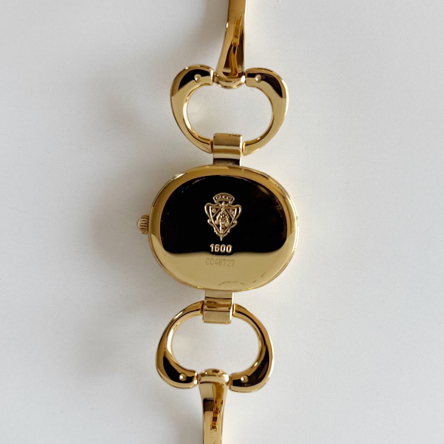 Gucci 1990s Oval Black Dial Gold Plated Bangle Watch (Small)