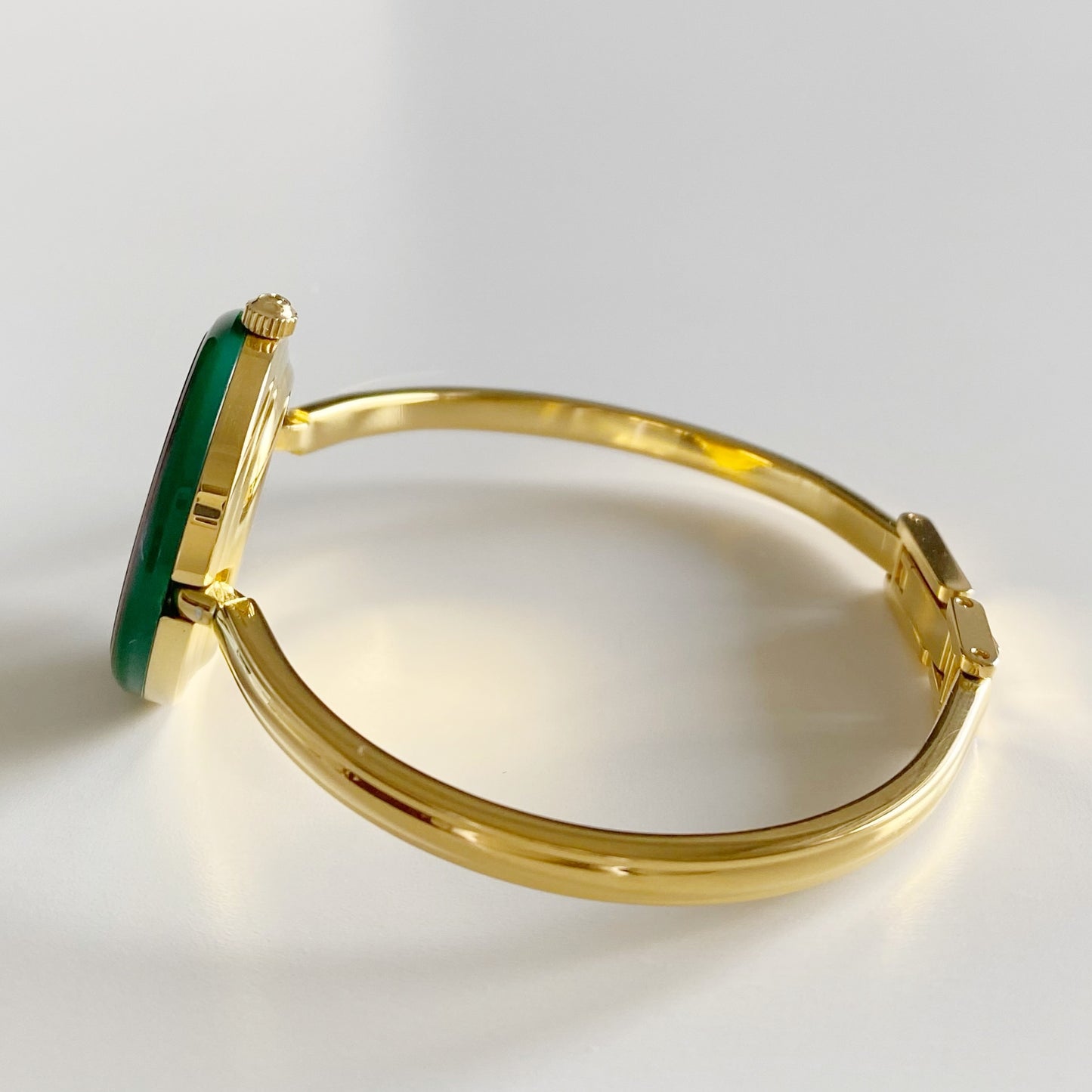 Gucci 1990s Interchangeable Bezel Gold Plated Bangle Watch with 12 bezels, case
