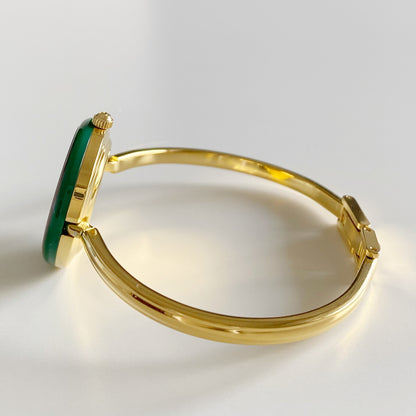 Gucci 1990s Interchangeable Bezel Gold Plated Bangle Watch with 12 bezels, case