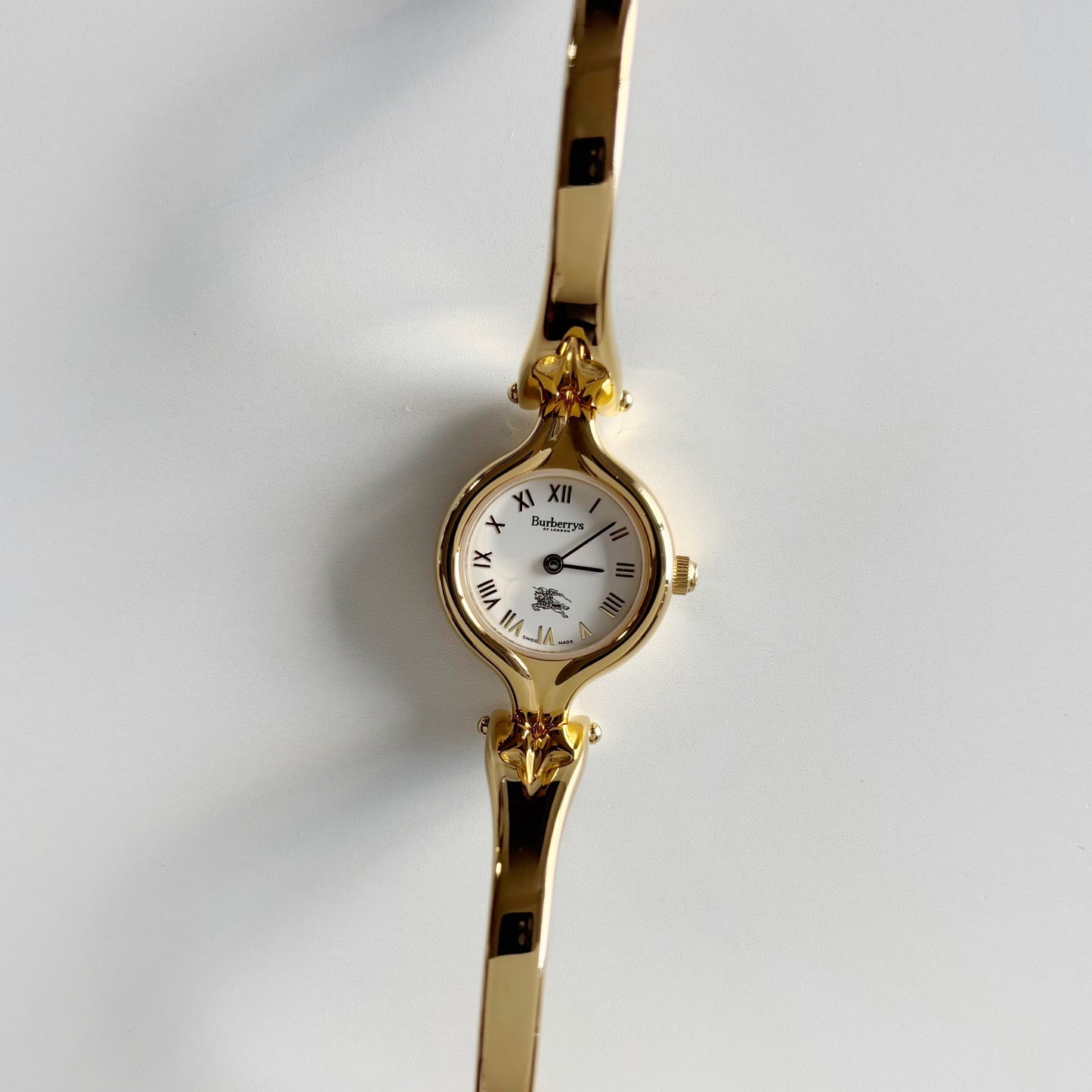 Burberry 1990s Round Dial Gold Plated Bangle Watch