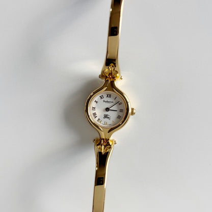 Burberry 1990s Round Dial Gold Plated Bangle Watch