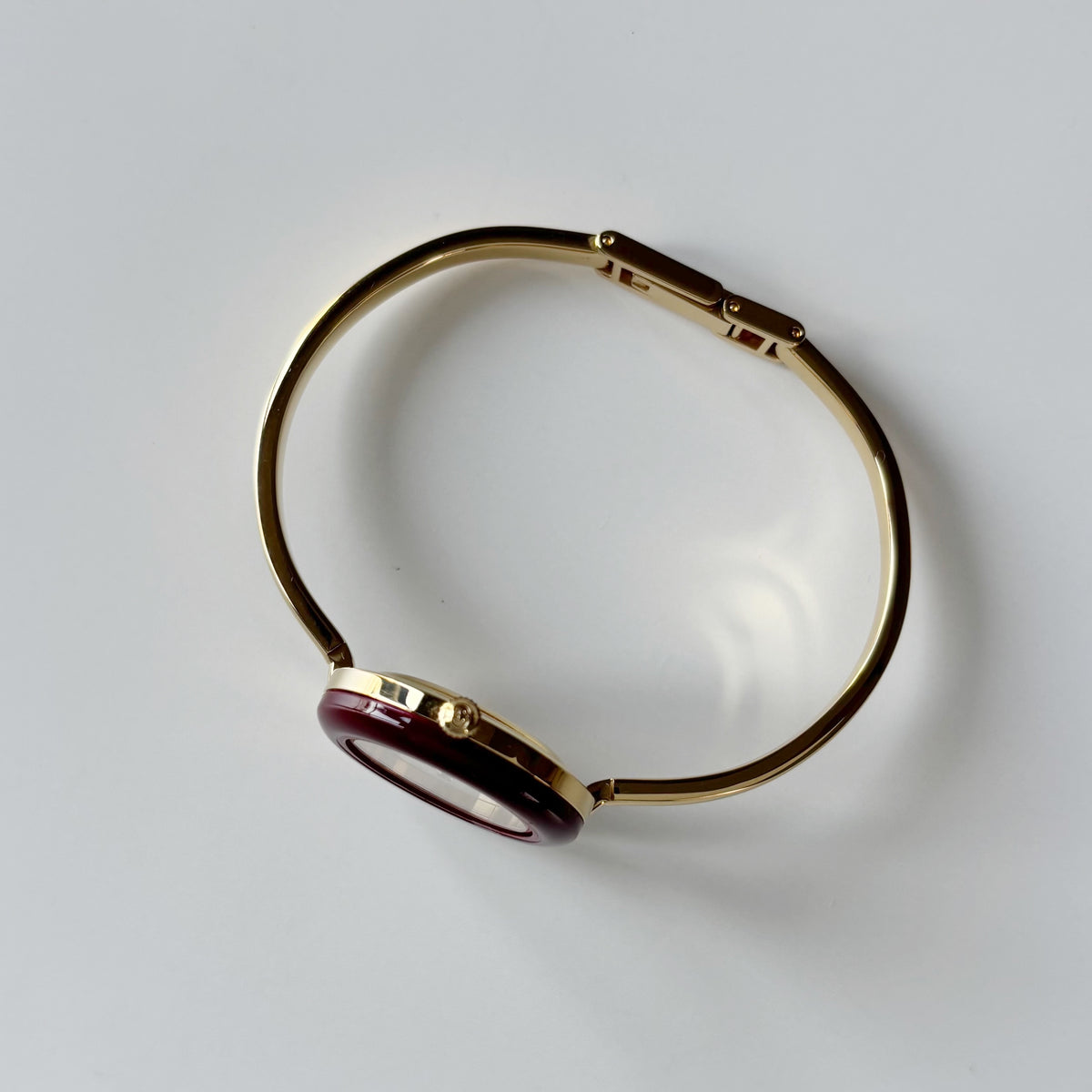 Gucci 1990s Interchangeable Bezel Gold Plated Bangle Watch with 12 bezels, case
