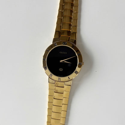 Gucci 1980s Black Round Dial Gold Plated Watch (Large)