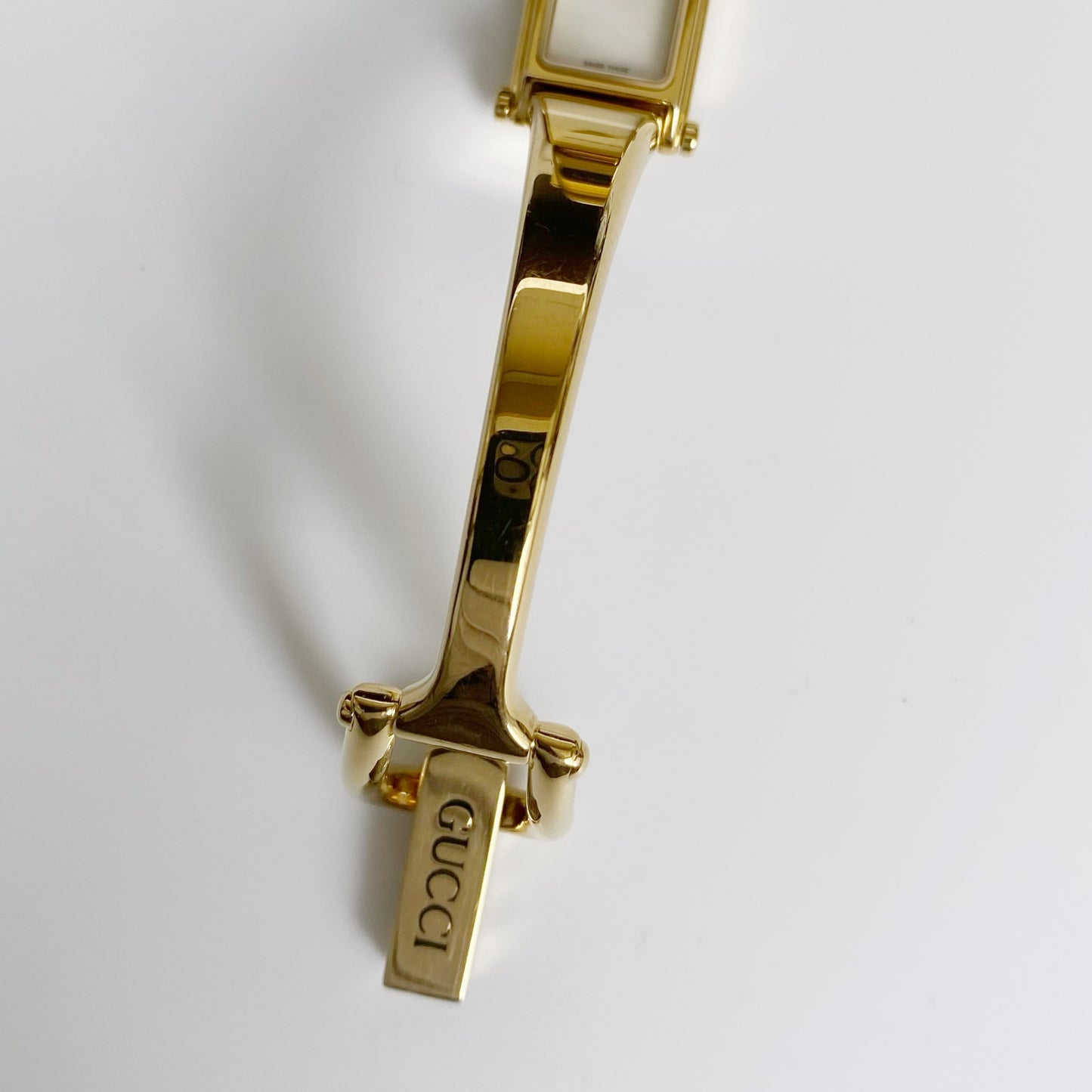 Gucci 1990s Seashell Dial Rectangular Gold Plated Bangle Watch