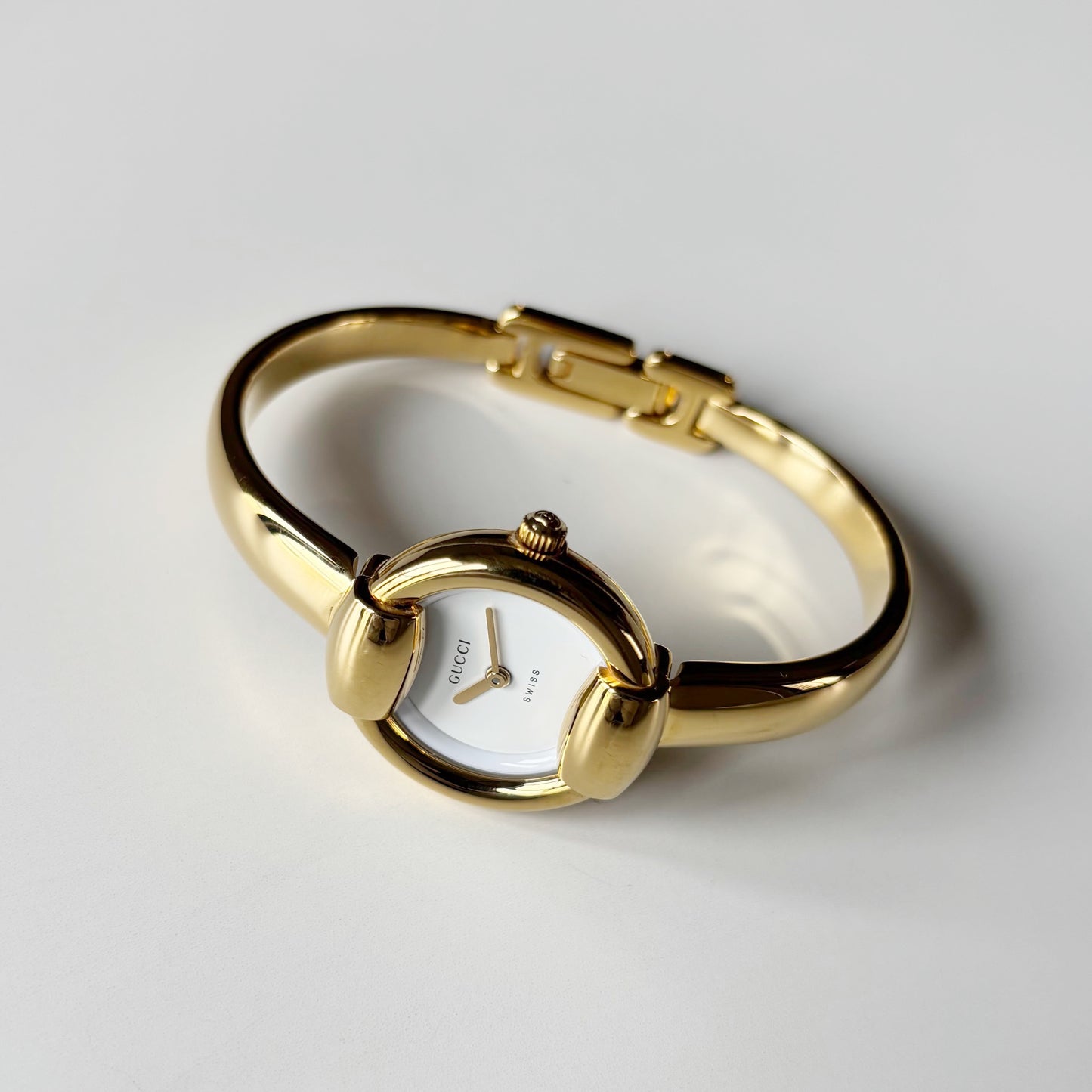 Gucci 1990s Round Dial Gold Plated Bangle Watch