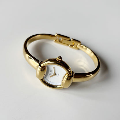 Gucci 1990s Round Dial Gold Plated Bangle Watch