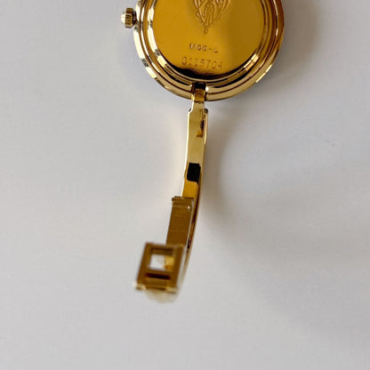 Gucci 1990s Interchangeable Bezel Gold Plated Bangle Watch with 12 bezels, case (Small)