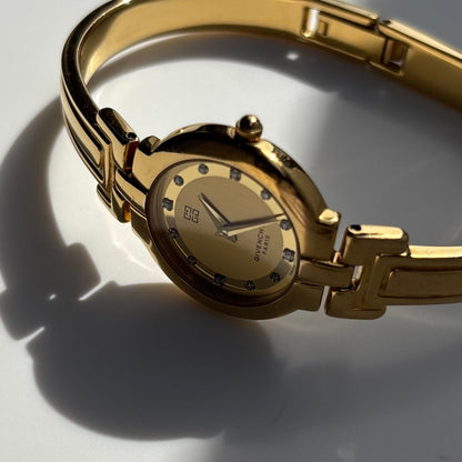 Givenchy 1990s Round Dial Gold Plated Bangle Watch