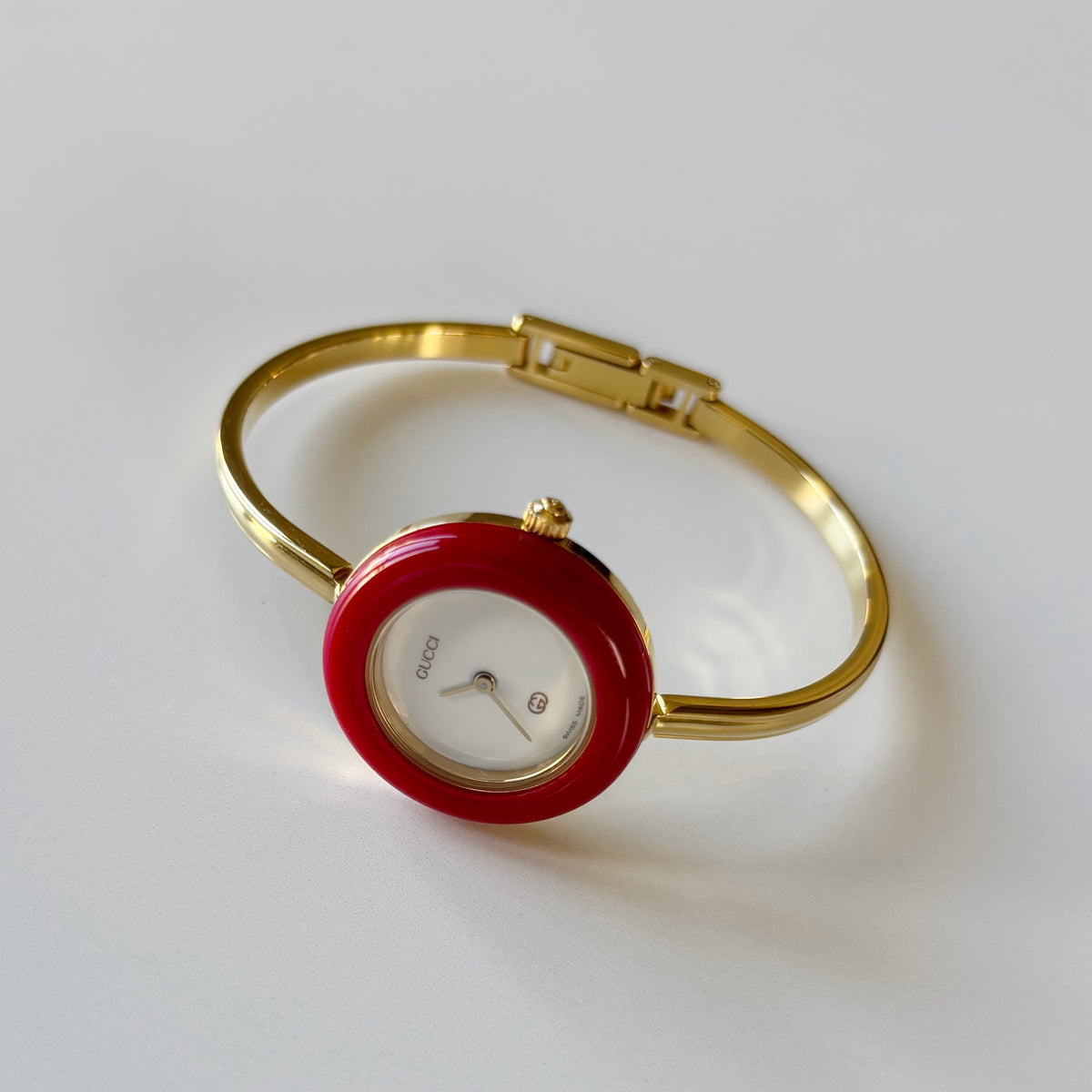 Gucci 1990s Interchangeable Bezel Gold Plated Bangle Watch with 12 bezels, case