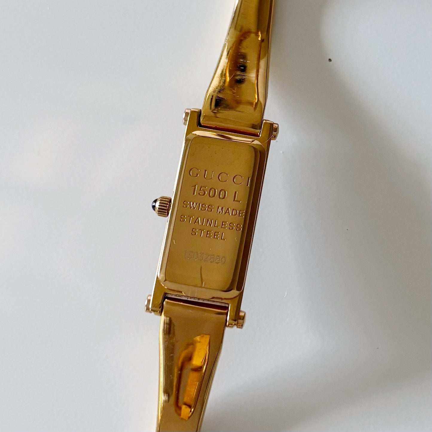 Gucci 1990s Rectangular Black Dial Gold Plated Bangle Watch