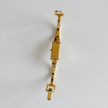 Gucci 1990s Seashell Dial Rectangular Gold Plated Bangle Watch