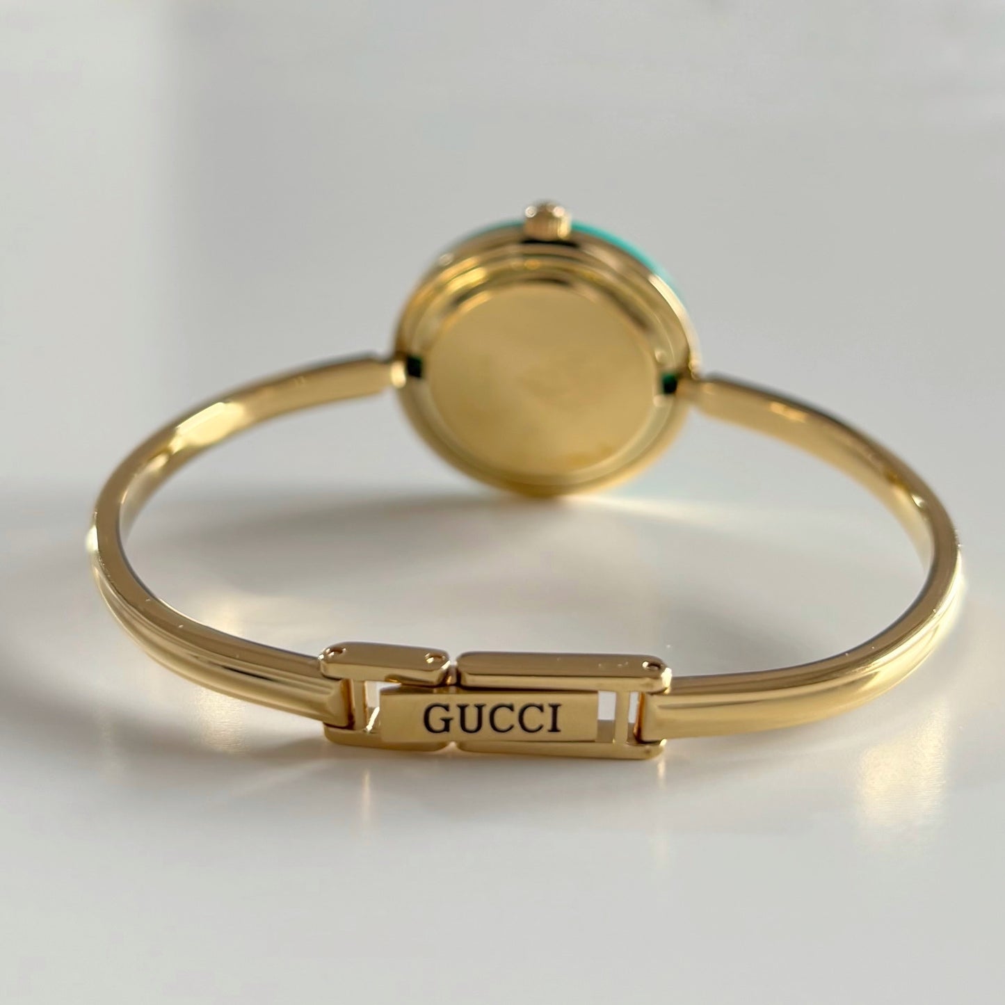 Gucci 1990s Interchangeable Bezel Gold Plated Bangle Watch with 12 bezels, case