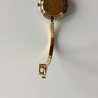 Gucci 1990s Interchangeable Bezel Gold Plated Bangle Watch with 12 bezels, case