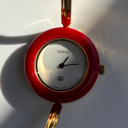 Gucci 1990s Interchangeable Bezel Gold Plated Bangle Watch with 12 bezels, case