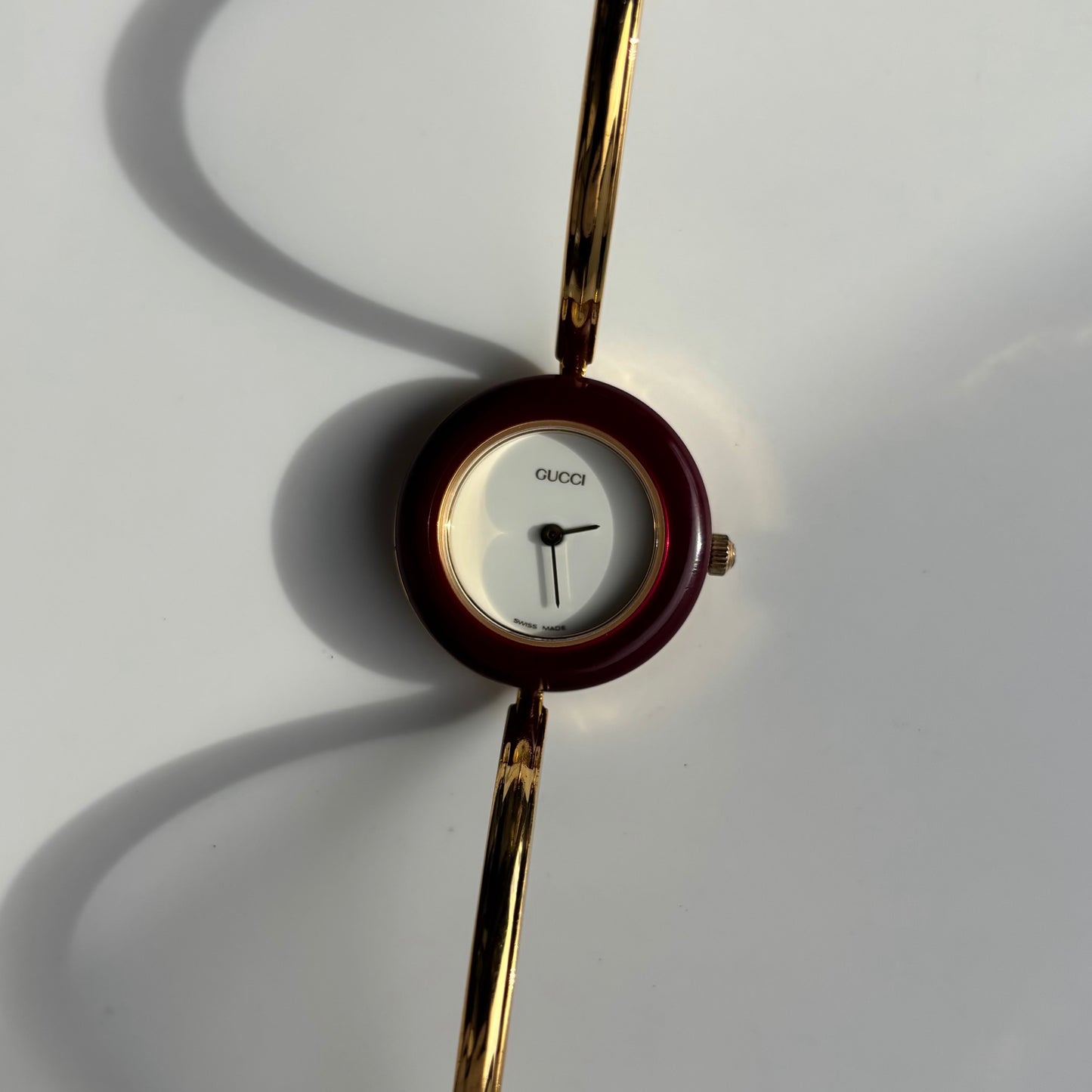 Gucci 1990s Interchangeable Bezel Gold Plated Bangle Watch with 12 bezels, case
