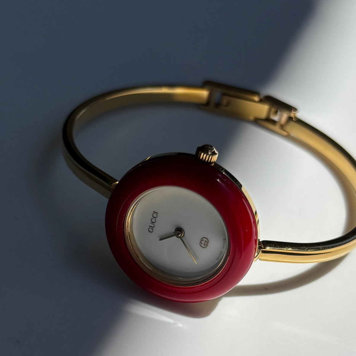 Gucci 1990s Interchangeable Bezel Gold Plated Bangle Watch with 12 bezels, case