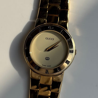 Gucci 1990s Round Dial Gold Plated Watch