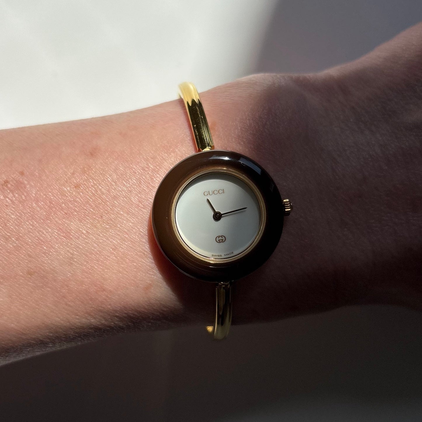 Gucci 1990s Interchangeable Bezel Gold Plated Bangle Watch with 12 bezels, case