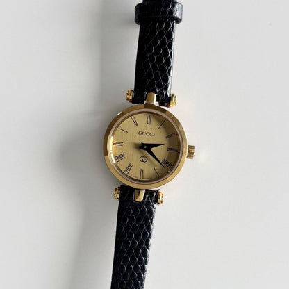 Gucci 1990s Round Dial Gold Plated Watch