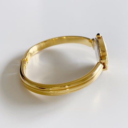 Yves Saint Laurent Seashell Dial Gold Plated Bangle Watch
