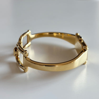 Gucci 1990s Rectangular Gold Dial Gold Plated Bangle Watch