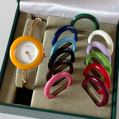 Gucci 1990s Interchangeable Bezel Gold Plated Bangle Watch with 12 bezels, case