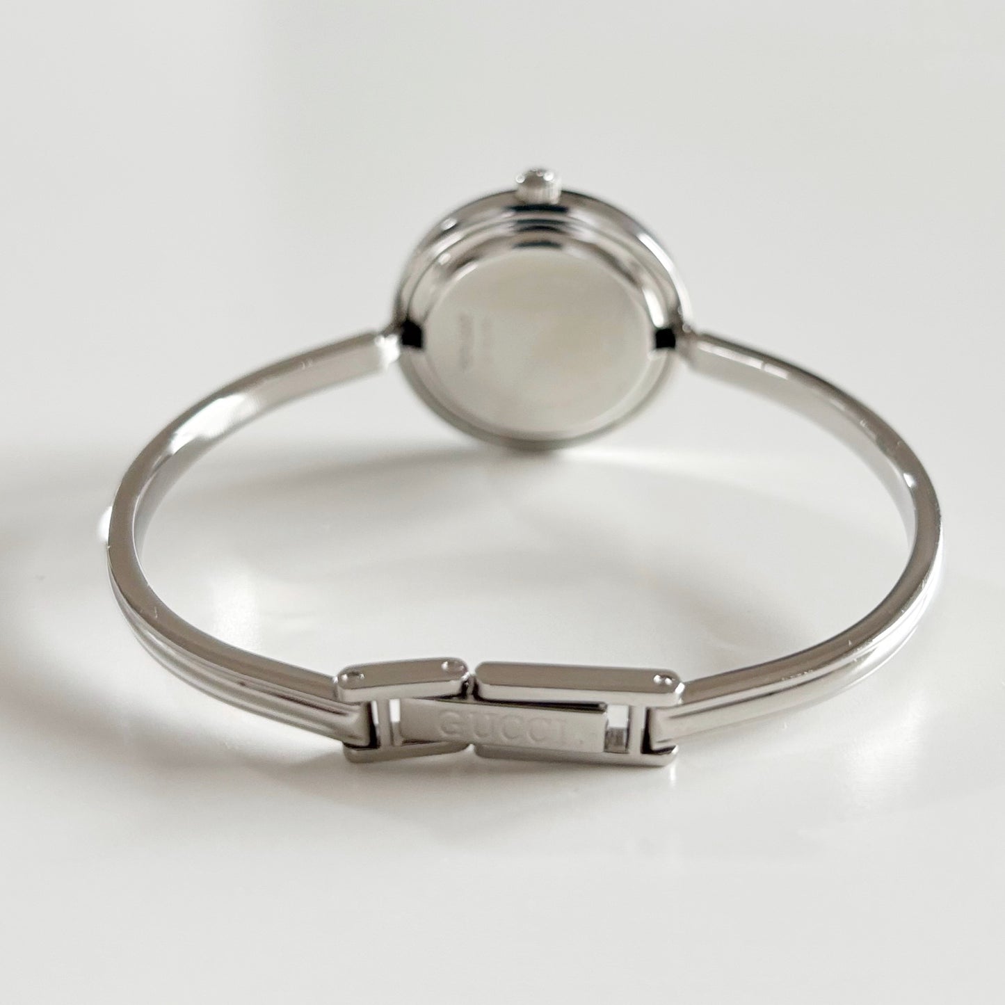 Gucci 1990s Interchangeable Bezel Stainless steel Bangle Watch with 12 bezels, case