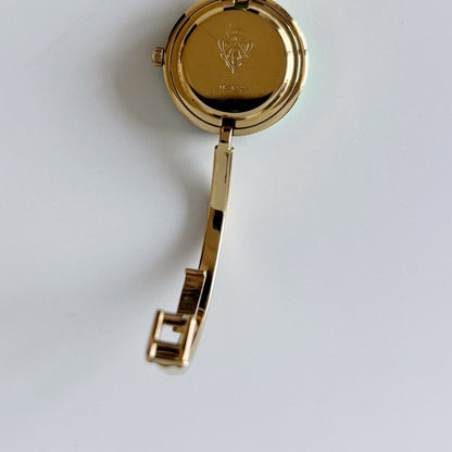 Gucci 1990s Interchangeable Bezel Gold Plated Bangle Watch with 12 bezels, case