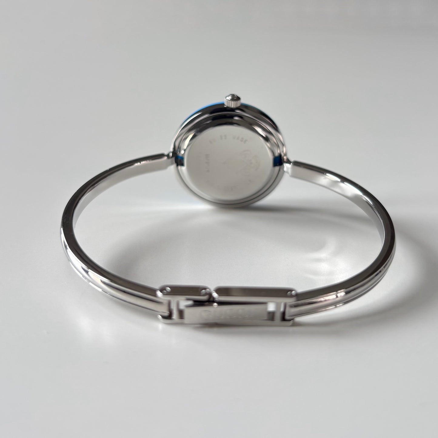 Gucci 1990s Interchangeable Bezel Silver Stainless steel Bangle Watch with 12 bezels, case