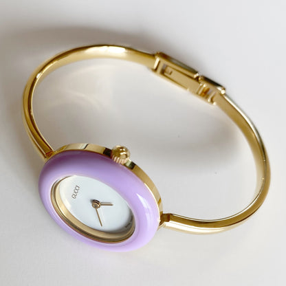 Gucci 1990s Interchangeable Bezel Gold Plated Bangle Watch with 12 bezels, case