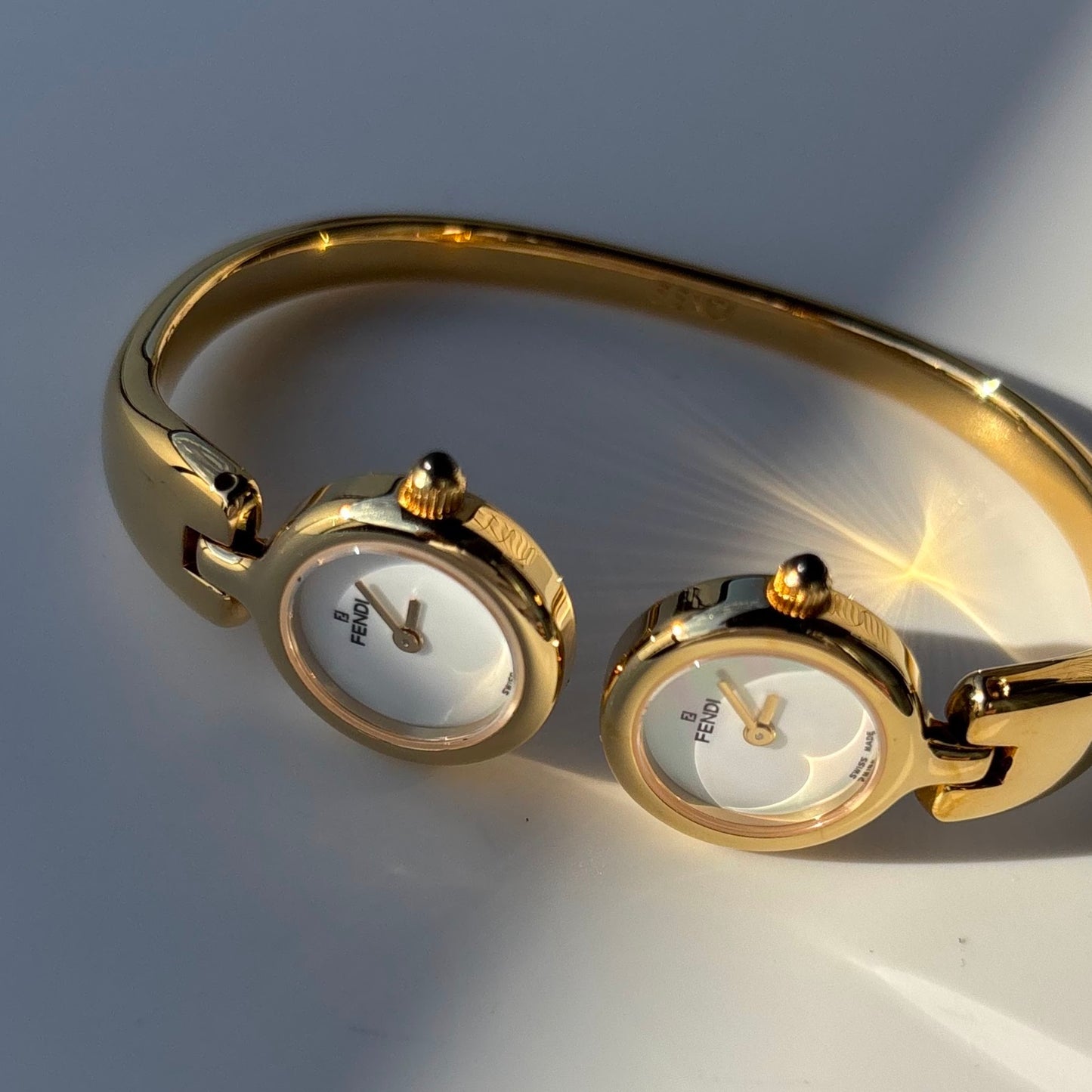 Fendi 1990s Seashell Dial Two Time Zone Gold Plated Bangle Watch